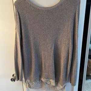 Oversized grey sweater with laced trim